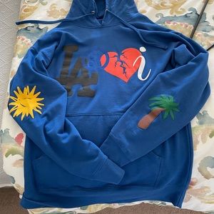 The Kid Laroi “Laroi Family” hoodie in blue from laroifamily.com